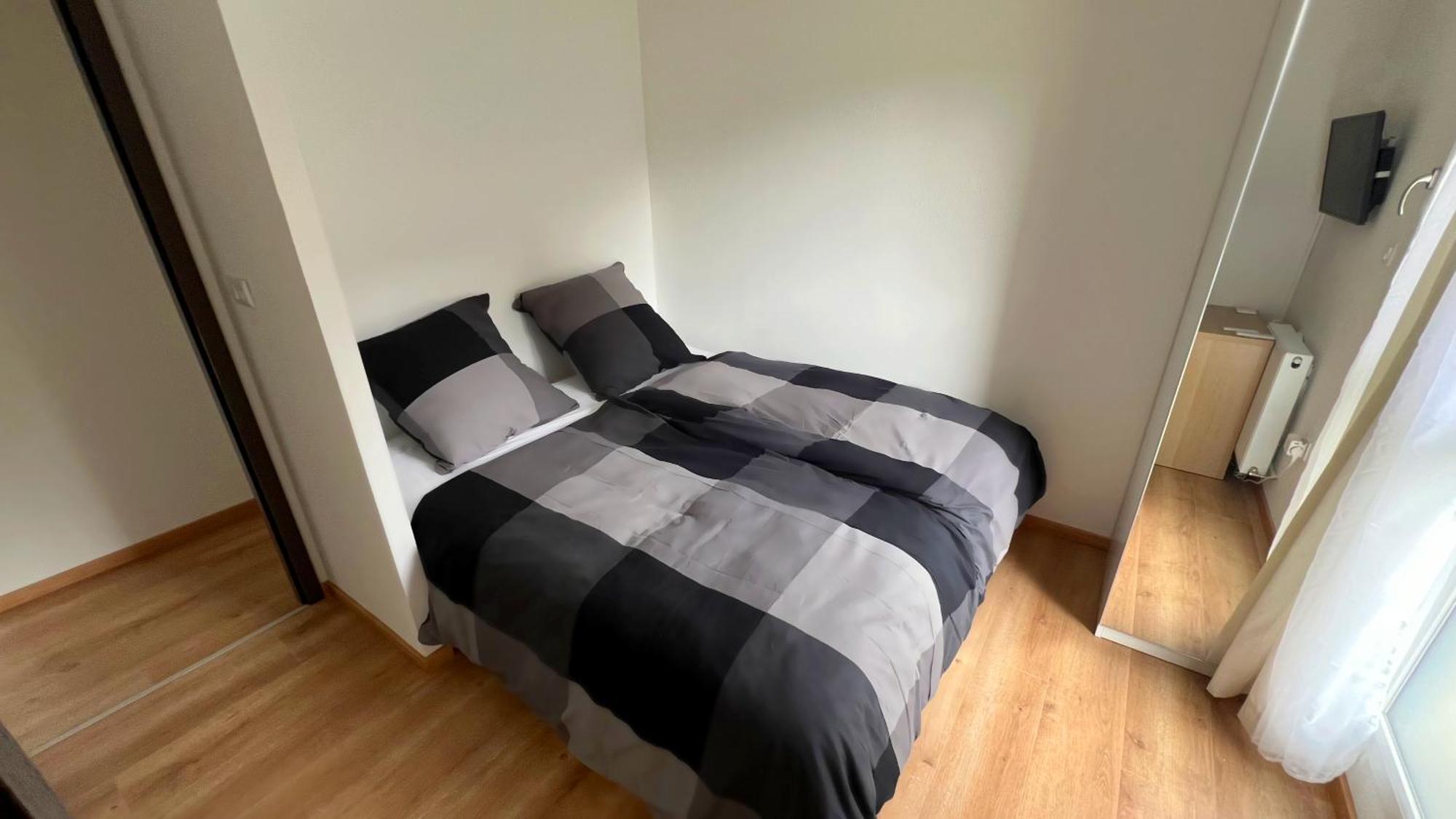 With Double Size Bed In Center